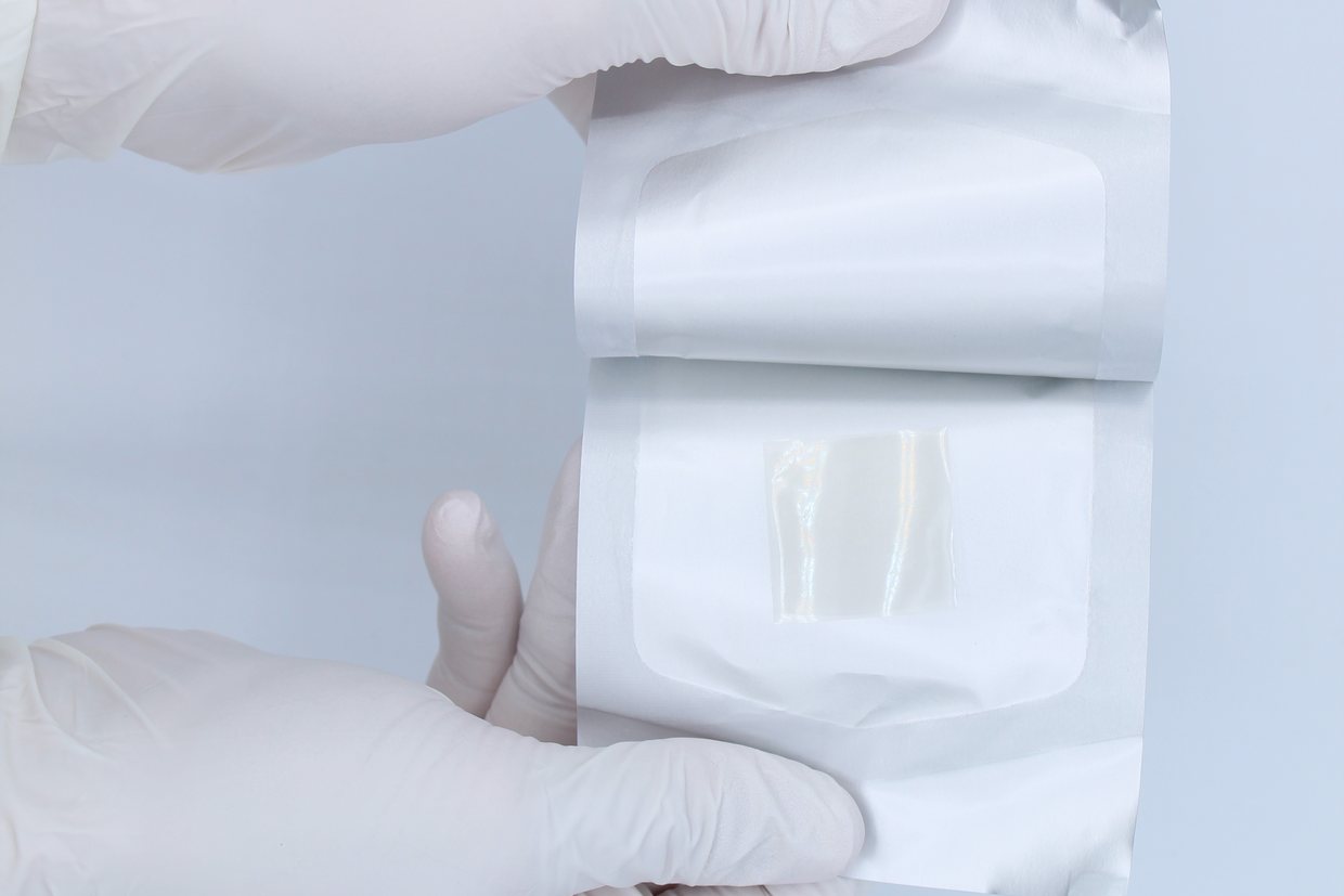 The outer pouch being opened